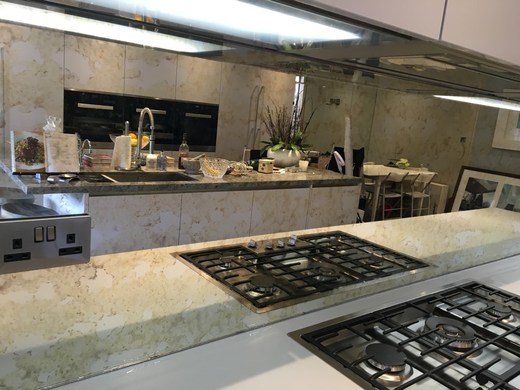 Mirror glass splashback in Dunstable luxury kitchen