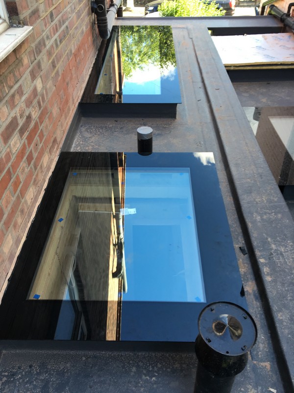 Multiple flat roof skylights on extension in Dunstable